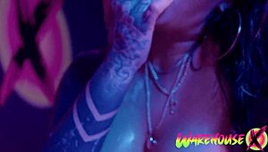 Inked babe in the bathtub starts masturbating, her fingers diving into that tight pussy.