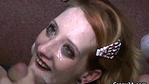 Blonde drenched in jizz during wild blowbang session