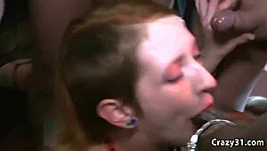 Blonde drenched in jizz during wild blowbang session