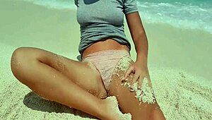 Sexy Blonde Masturbates by the Sea with Hot Ass Covered in Sand