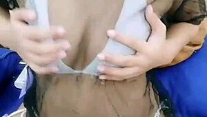 asian stripper teasing with clothes ripped during striptease