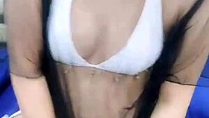 asian stripper teasing with clothes ripped during striptease