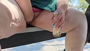 Big BBW MILF fingers her wet pussy to orgasm outdoors with toys in public park. Watch her climax intensely.