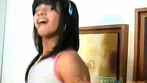 Petite lesbian teen explores her body with sensual fingering
