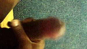 Watch this black guy rubbing his monster cock.