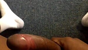 Watch this black guy rubbing his monster cock.