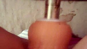 girl plays with her pussy using a machine