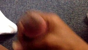 Watch this black guy rubbing his monster cock.