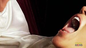 After sucking the large dick, the blonde with big tits gets fucked from behind