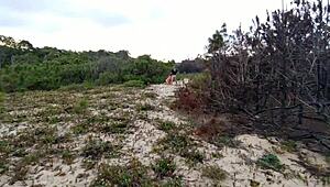 Caught Crossdressing Couple Cumming on Beach.