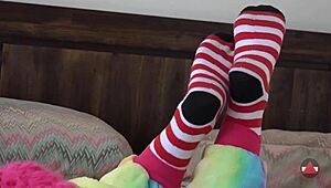 Asian cosplayer rips clothes in striped socks striptease solo