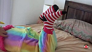 Asian cosplayer rips clothes in striped socks striptease solo
