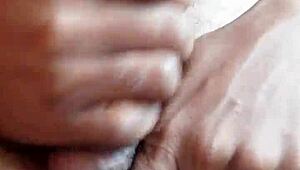 Anonrio's big black cock gets a handjob in part 2