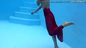 tiny skinny pornstar hermione ganger swims in the pool