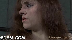 Is this chick gagged and stuffed in her wet pussy?