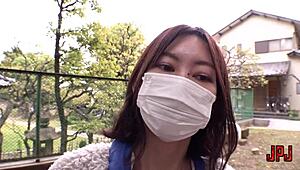 Married Japanese housewife boldly exposing her small tits and hairy body in public park