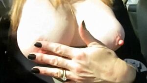 elena undresses in the car outdoors