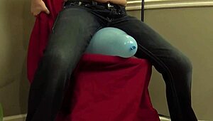 Hey, watch Fifi Foxx sit and pop balloons topless