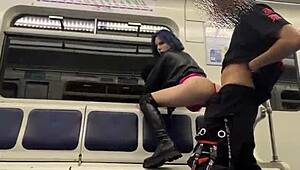 Passionate couple engages in open-air intimacy on a commuter train