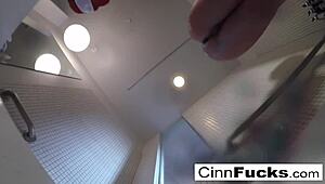 Christiana cinn glistens in her shower and bathtub.