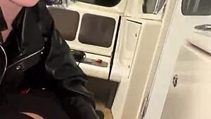 Passionate couple engages in open-air intimacy on a commuter train