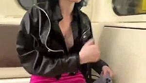 Passionate couple engages in open-air intimacy on a commuter train