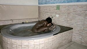 Sex in the bathtub with lots of cum in mouth.