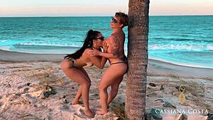 on the african beach, cassiana costa engages in lesbian muff diving and licking with her partner