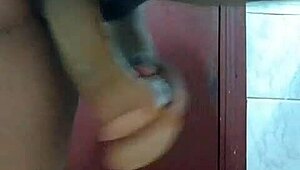 Latina brunette masturbates with dildo in bathroom homemade