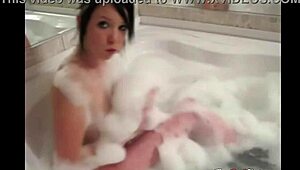 Tiny red slut with perfect body teases in the bathtub. Her fingering game is pure fire.