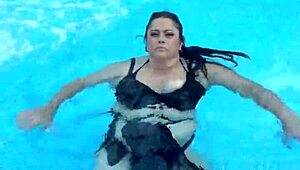 Cute girl with natural breasts plays in the pool