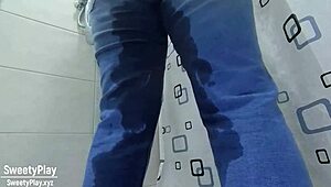Wet and wild: milf desperately pees in jeans