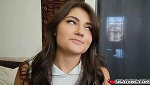 Adria Rae blows her stepbrother's big cock in this hardcore scene