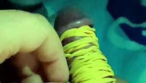 IFOSLAVE PLAYING WITH RUBBER BANDS