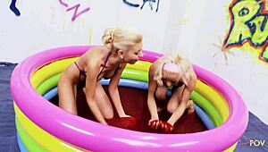 Busty blondes wrestle in jello and finger each other intensely