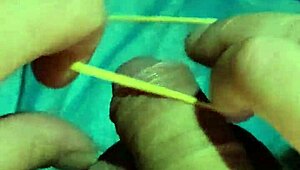 IFOSLAVE PLAYING WITH RUBBER BANDS