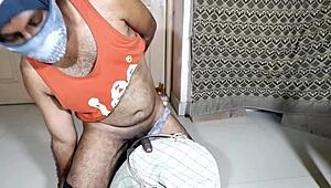 A black man's hard penis penetrates a metal container