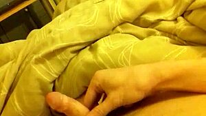 Bedroom wank with long thin cock ends in massive cumshot explosion