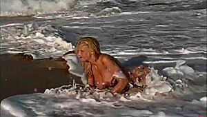 Busty Michelle Marsh, the sexiest woman alive, shows off her big tits in a stunning model shoot. Her boobs steal every scene!