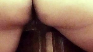 young woman slowly rubs her wet pussy in solo masturbation video