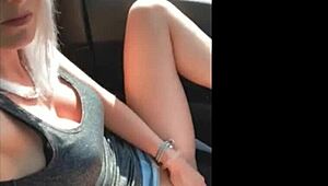 Imagine this amazing blonde fingering herself in the car, outdoors.