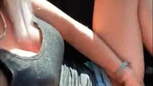 Imagine this amazing blonde fingering herself in the car, outdoors.