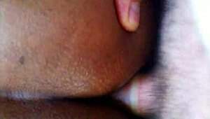 Interracial couple engages in oral and anal sex