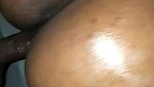 Curvy ebony MILF gets oiled up for some intense action