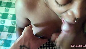 Ebony babe gives oral and gets cum on tits