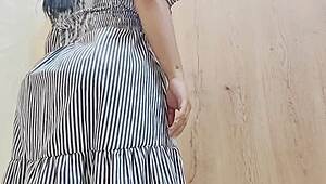 Hidden camera captures Latina woman dressing outdoors
