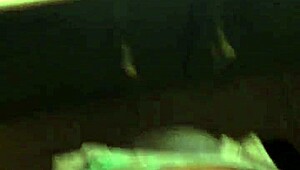 This sexy babe plays with a huge cock, sucking and masturbating it