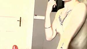 Luisastarvip's solo video features a thin teenager indulging in pleasure with a red dildo in the kitchen