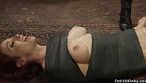 Waxed lesbian whipped in lezdom