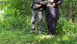 Fingering a fat milf’s ass while she jerks me off in the park